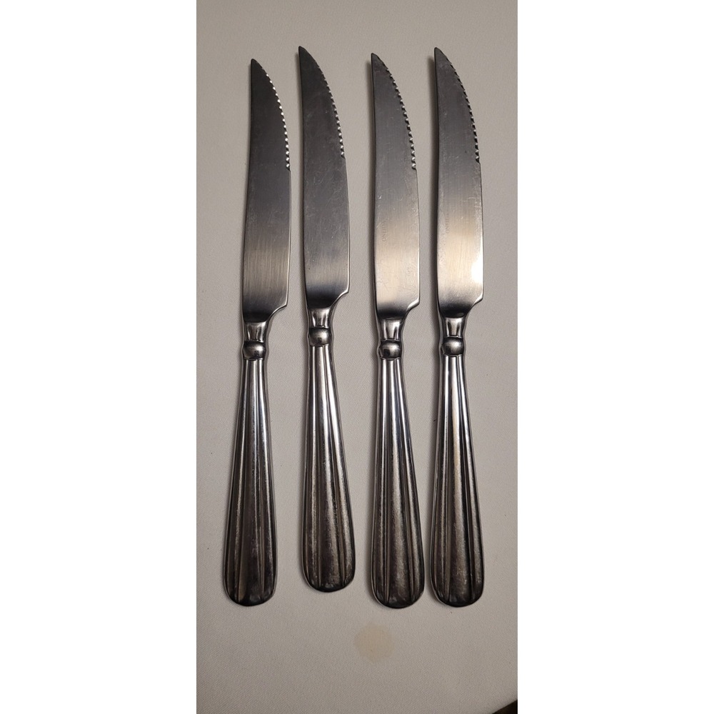 Unity Oneida Community Stainless flatware 4 Dinner Knives glossy 1994